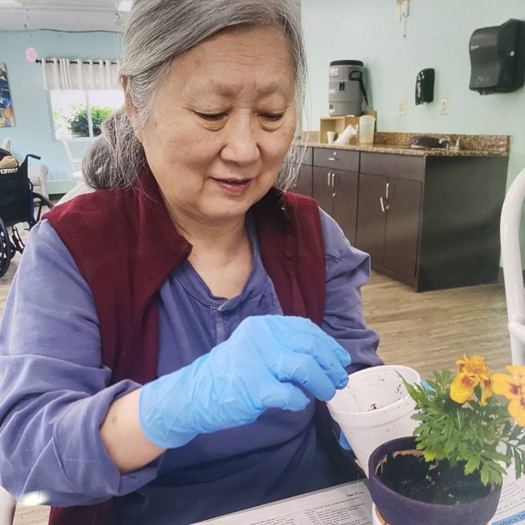 Cedar Woods staff member supporting residents in the community