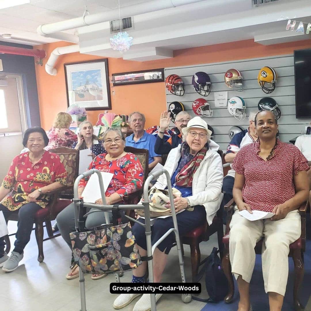 Residents enjoying a group activity at Cedar Woods Assisted Living and Memory Care in Belleville, Michigan