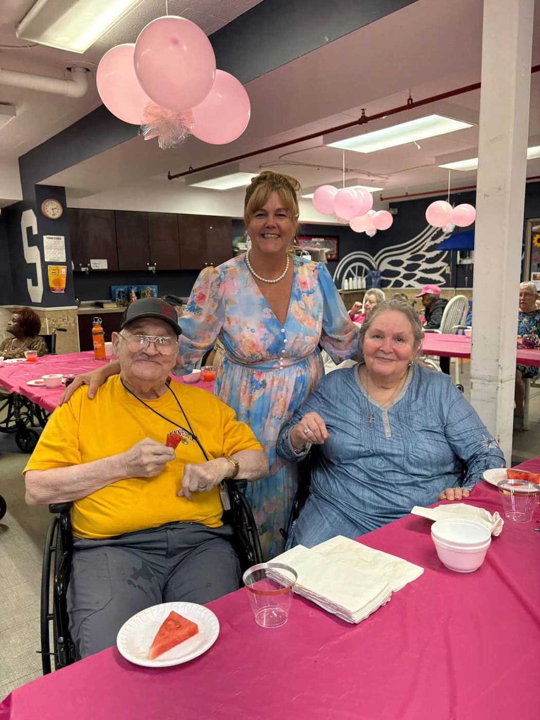 Cedar Woods staff member sharing time with a resident during an activity