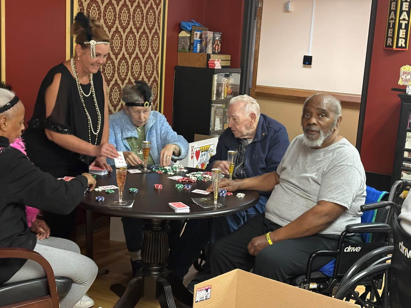 Residents enjoying a social game together at Cedar Woods Assisted Living